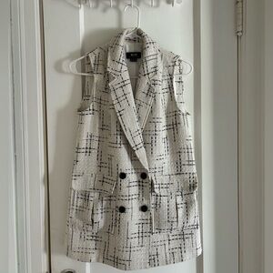 fun black and white vest from Anthropologie brand Maeve